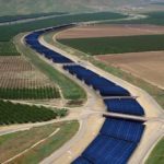 An artist rendering shows how solar panels might be placed atop the California Aqueduct in western Stanislaus County. SOLAR AQUAGRID LLC