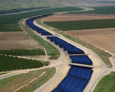 An artist rendering shows how solar panels might be placed atop the California Aqueduct in western Stanislaus County. SOLAR AQUAGRID LLC