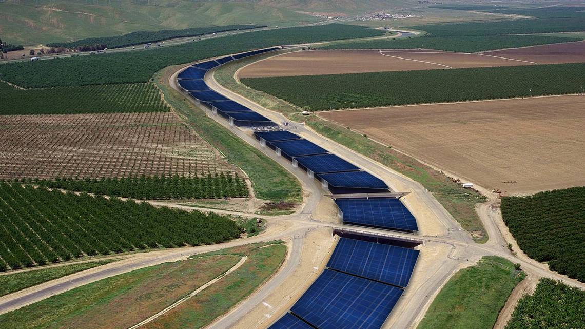 An artist rendering shows how solar panels might be placed atop the California Aqueduct in western Stanislaus County. SOLAR AQUAGRID LLC