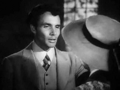 Actor James Mitchell in a black-and-white frame from the 1950 Stars in My Crown trailer.