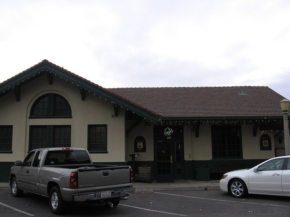 The former Southern Pacific depot in downtown Turlock, with its tiled roof and arched window, photographed in October 2012.