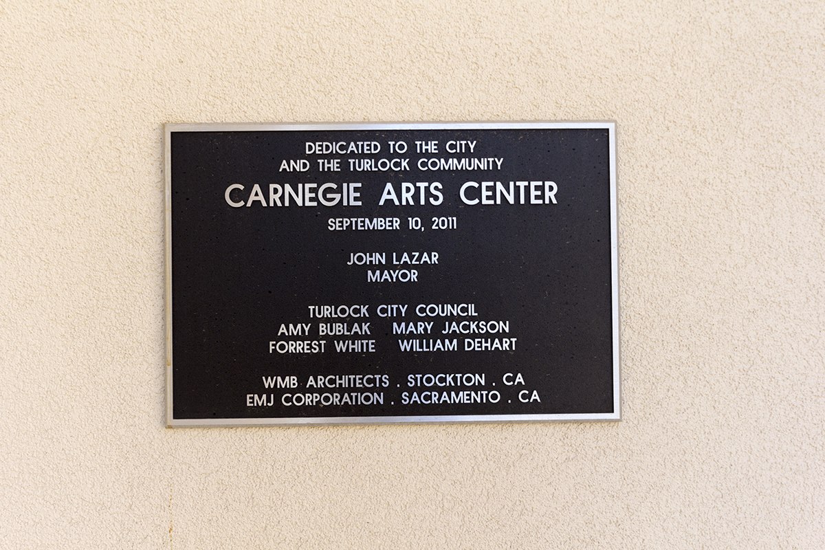 A Carnegie Arts Center plaque marks the September 10, 2011 dedication in Turlock.
