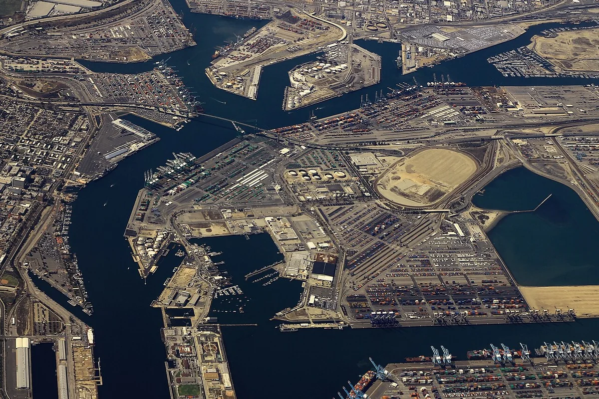 Ships, container terminals and cranes at the Port of Long Beach, photographed from the air in 2015.