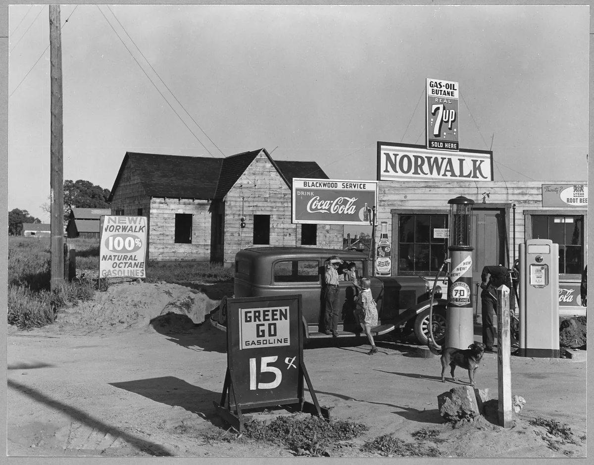 Blackwood family store and trading center with a gasoline pump in Riverbank, photographed by Dorothea Lange in 1940