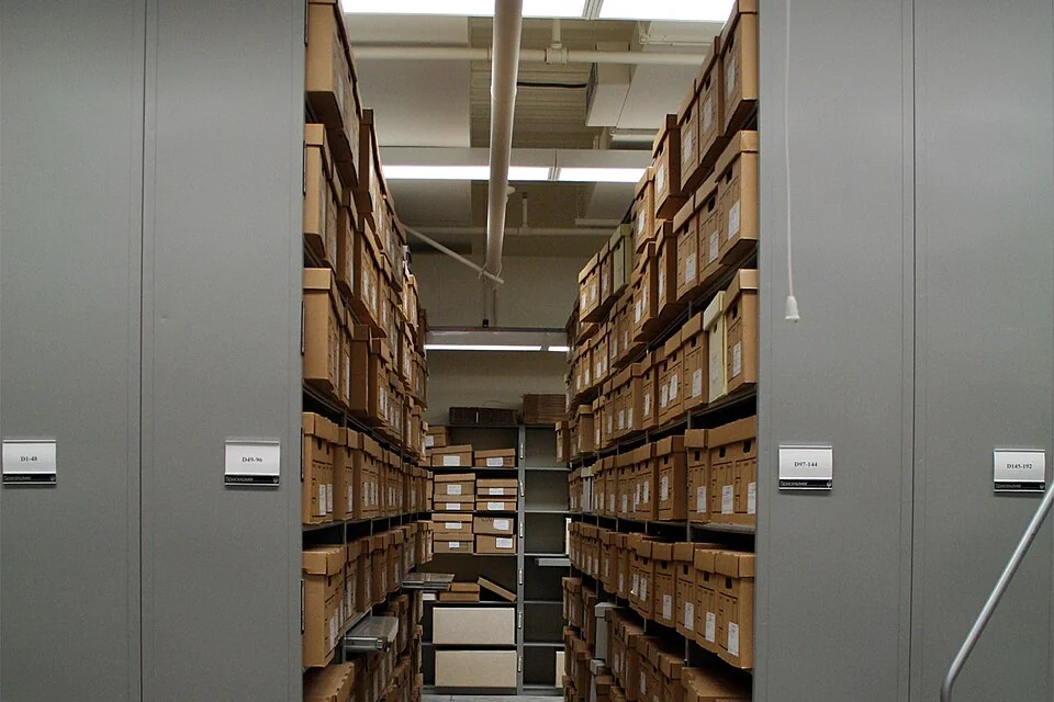 Rows of labeled archival boxes on shelves at the California State Archives in Sacramento in October 2007.
