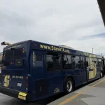 A blue-and-gold StanRTA bus at Modesto Transit Center on September 20, 2026.
