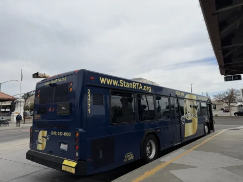 A blue-and-gold StanRTA bus at Modesto Transit Center on September 20, 2026.