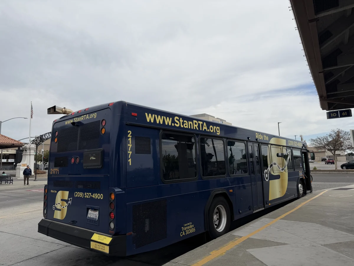 A blue-and-gold StanRTA bus at Modesto Transit Center on September 20, 2026.