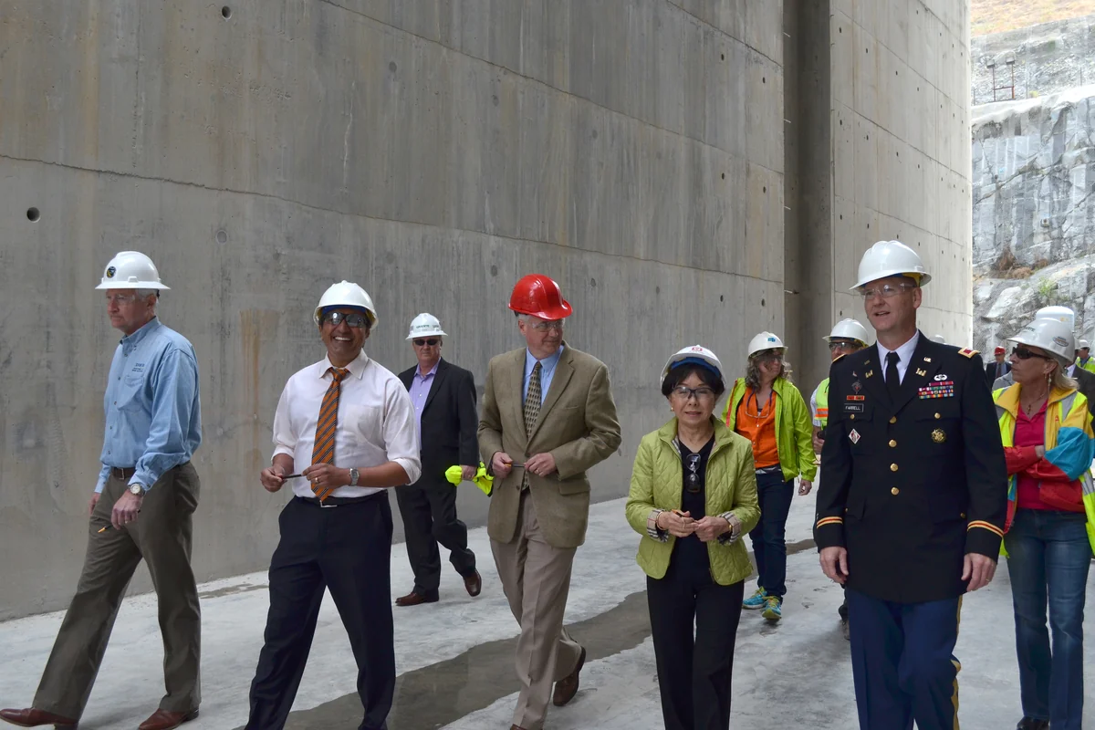 Tom McClintock walks with Doris Matsui, Ami Bera and Army Corps officials through the Folsom auxiliary spillway construction site in April 2014.