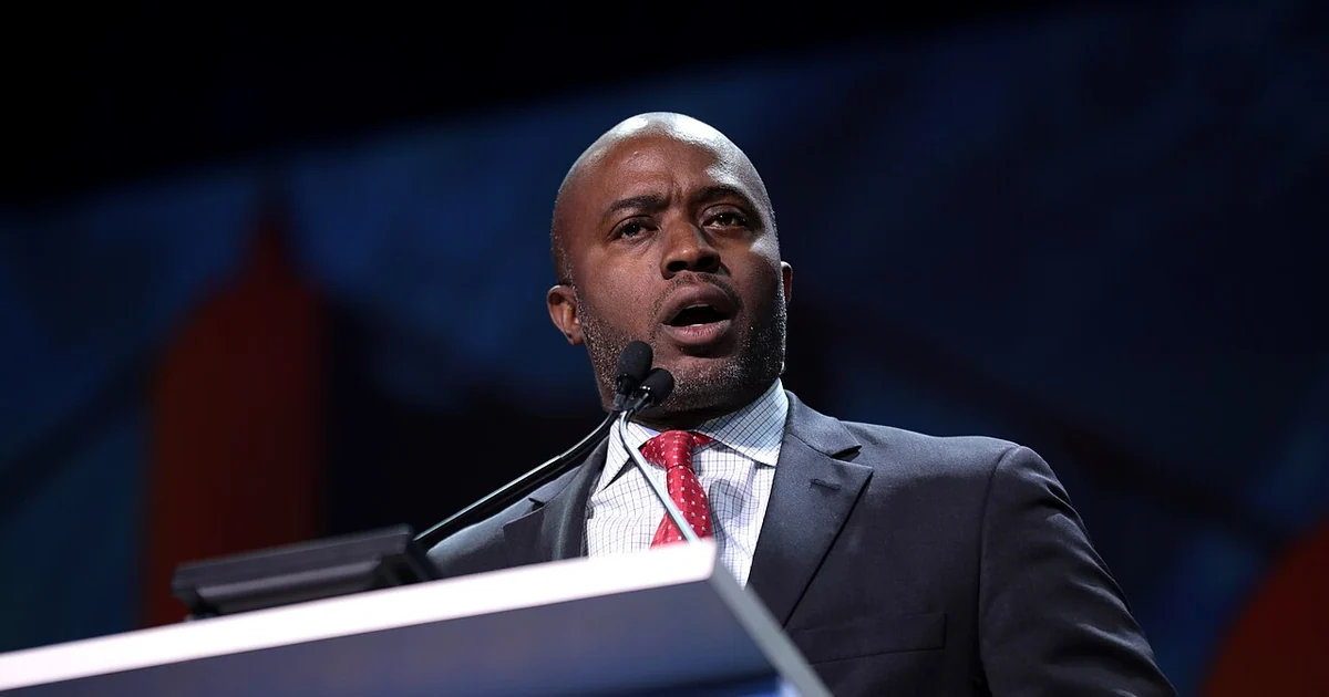Tony Thurmond speaks at a podium at the California Democratic Party convention in San Francisco in 2019.