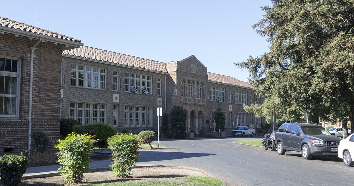 Decorative brick facade and entrance of the historic Turlock High School building on Canal Drive.